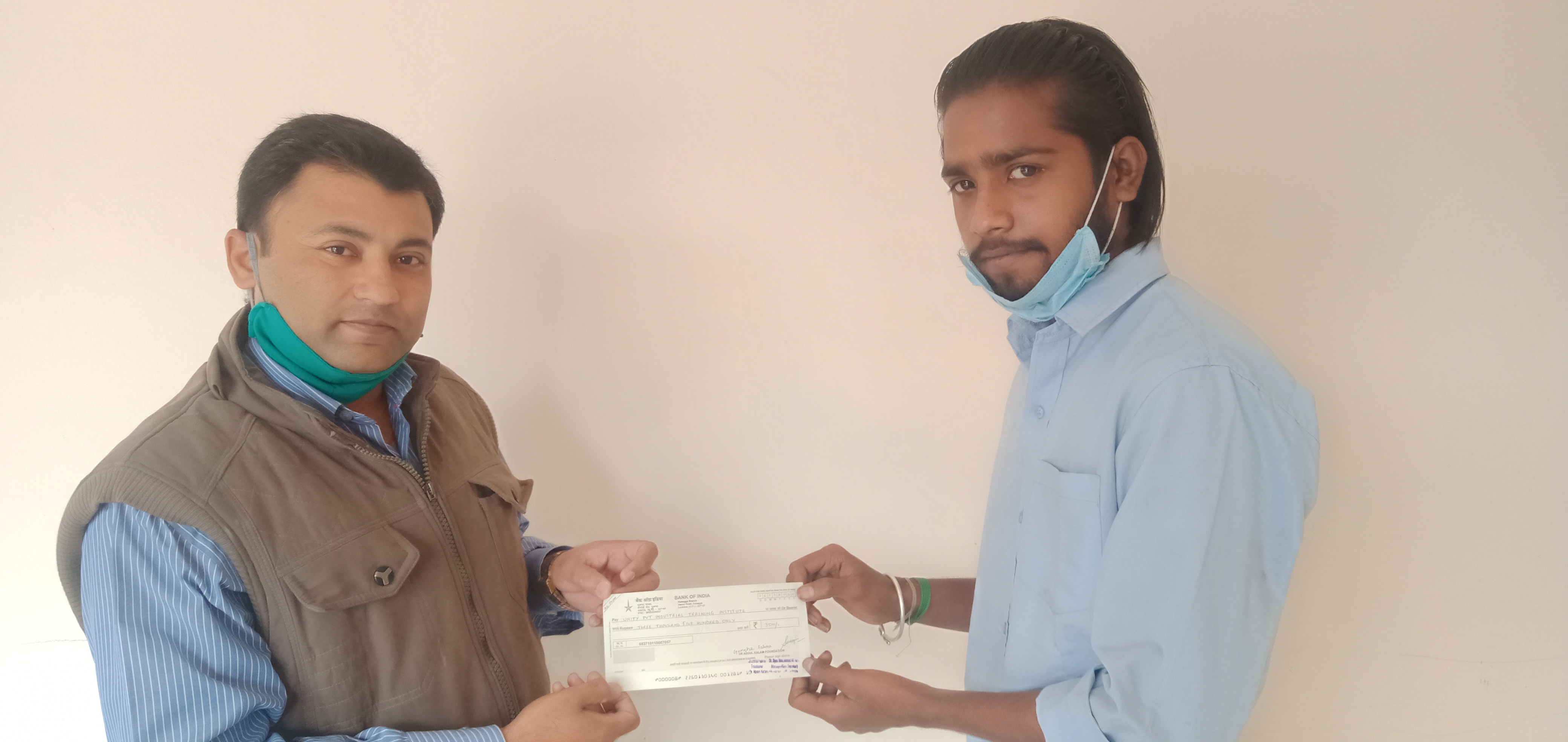 Giving Cheque for Education to Needy Students for further studies
